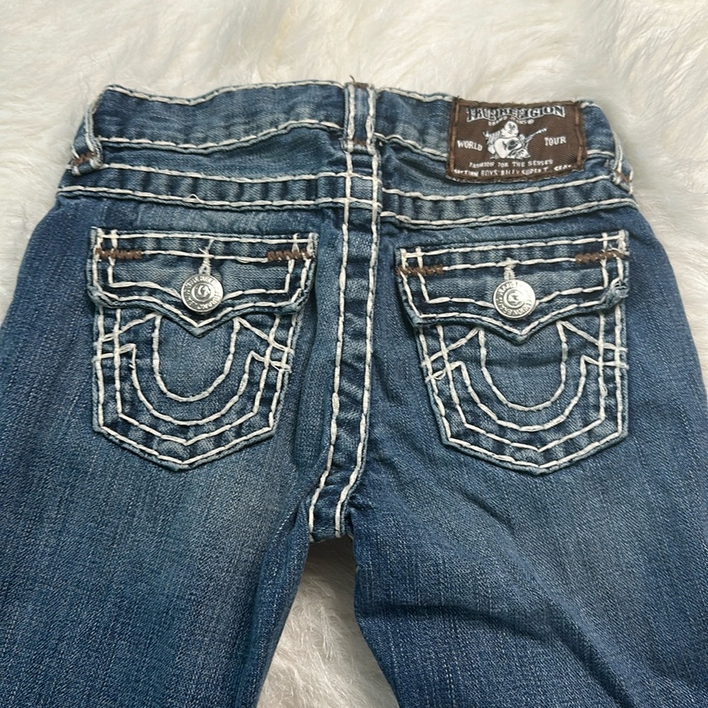 Boys blue and brown true religion. Jeans. Excellent condition size 7. Boot cut.